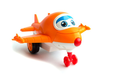 orange toy plane. children's toy. plastic toy