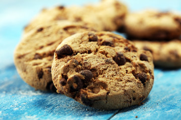 Chocolate cookies on wooden table. Chocolate chip cookies