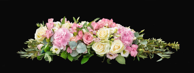 Flowers Gentle art composition. A wedding  bouquet from branches an eucalyptus, a hydrangea, Alstroemeria, gentle roses on a black background. Isolated