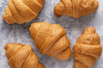Fresh croissants.Delicious croissants for breakfast with coffee.