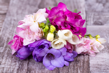 Bouquet of spring fresh freesia flowers herbal