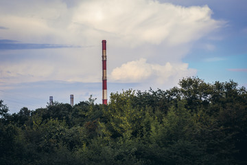 Fototapeta na wymiar Chimney of Power Station in Zeran district of Warsaw, capital city of Poland