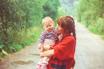 Mum the child on hands greens