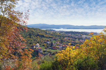Sunny autumn landscape.  Montenegro, view of Tivat city and Lustica peninsula from the slope of the mountain