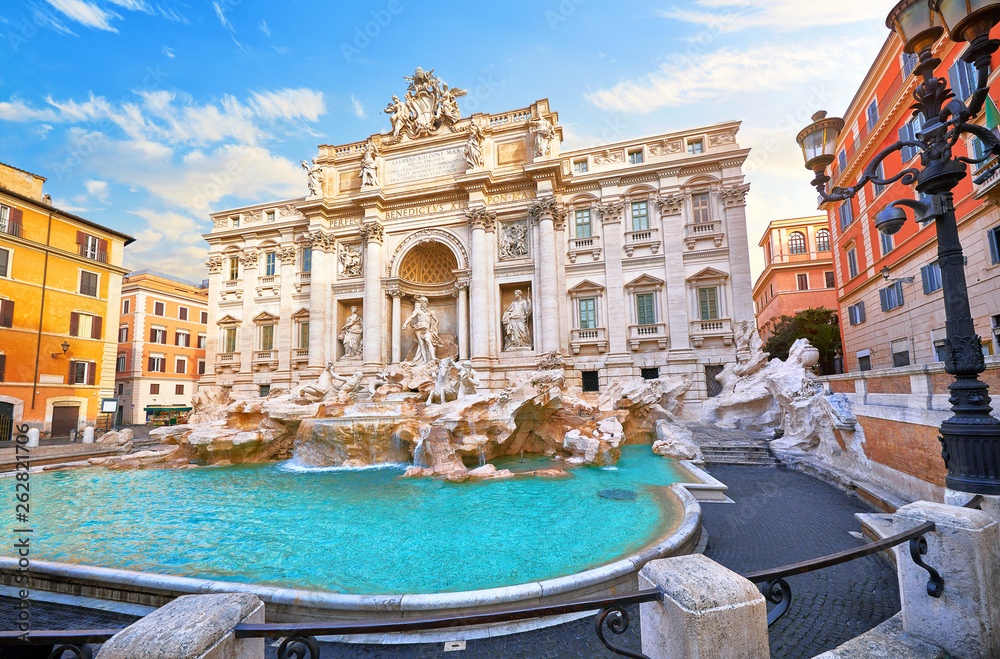 Wall mural trevi fountain in rome, italy. ancient fountain. roman statues at piazza in old medieval city among 