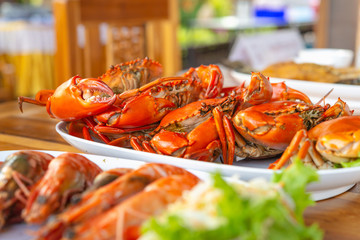 Steamed crabs with seafood spicy sauce.