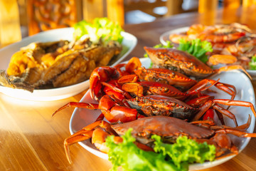 Steamed crabs with seafood spicy sauce.