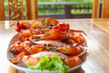 Steamed crabs with seafood spicy sauce.