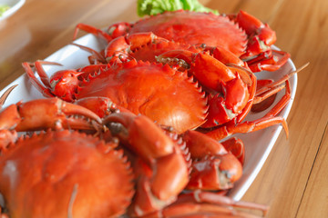 Steamed crabs with seafood spicy sauce.
