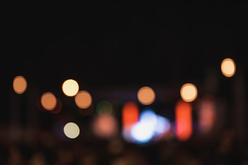 Fototapeta premium Colorful of light in concert at night.Blurred circle bokeh abstract background.