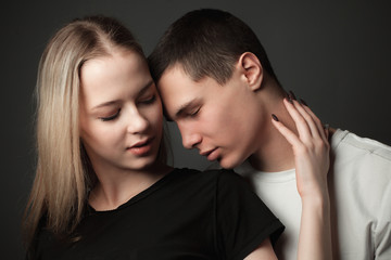 Couple in love on the black background