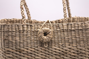 Wickerwork woman bag texture made from dry sedge isolate on white  background.Closeup surface...