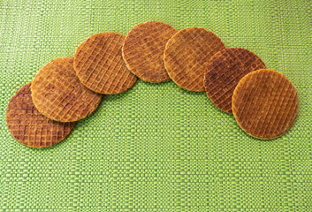 Stroopwafels in the shape of an arch arranged on the table