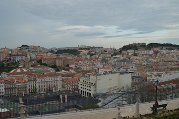 Fototapeta premium Panoramic Views Of The Alfama District Of Lisbon And The San Pedro De Alcantara Garden In Lisbon. Nature, architecture, history, street photography. April 11, 2014. Lisbon, Portugal.