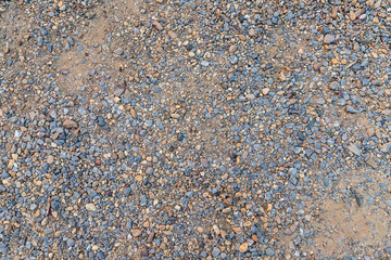 Colorful sand or pebble texture. Seamless texture on ground texture.