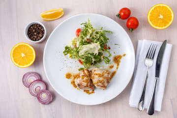 Chicken medallions in honey mustard sauce with microgreen