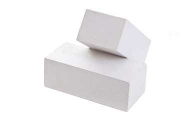 Two white ceramic bricks at the white background, isolated