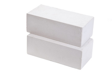 Two white ceramic bricks at the white background, isolated