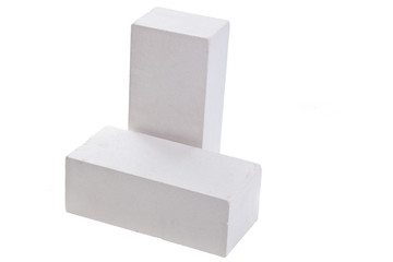 Two white ceramic bricks at the white background, isolated