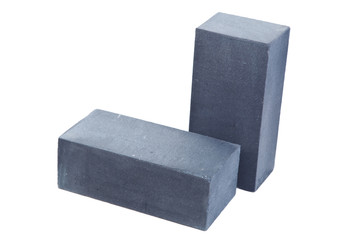 Two grey ceramic bricks at the white background, isolated