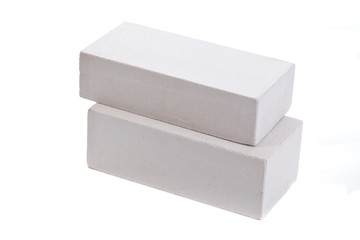 Two white ceramic bricks at the white background, isolated
