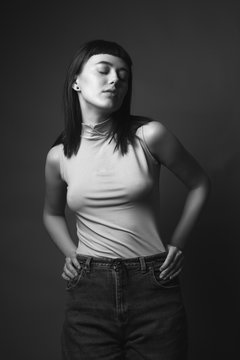 Attractive young woman in shirt. Black and white
