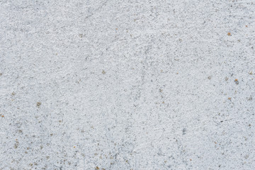 Wall fragment with scratches and cracks