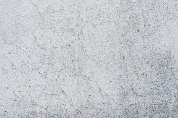 Wall fragment with scratches and cracks