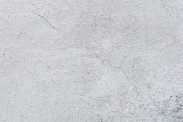 Wall fragment with scratches and cracks