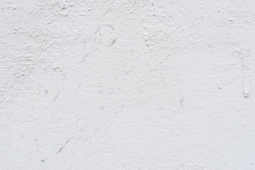 Wall fragment with scratches and cracks