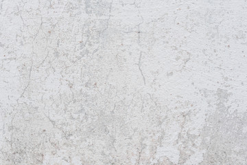 Wall fragment with scratches and cracks