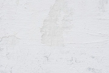Wall fragment with scratches and cracks