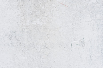 Wall fragment with scratches and cracks