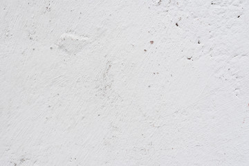 Wall fragment with scratches and cracks