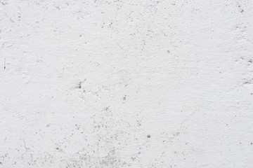 Wall fragment with scratches and cracks