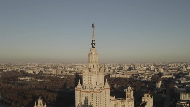 Aerial footage of Moscow State University communistic star in spring. Russia. HEVC/H.265, D-Cinelike, Dlog-M,