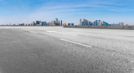 Fototapeta premium Road and skyline of urban architecture