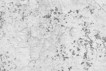 Fototapeta premium Wall fragment with scratches and cracks
