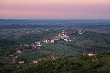 Fototapeta na wymiar Village Kozana between vineyards in wine region Brda in Slovenia