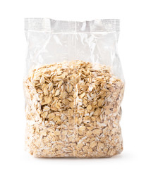 Oat flakes in a pack close-up on a white. Isolated.
