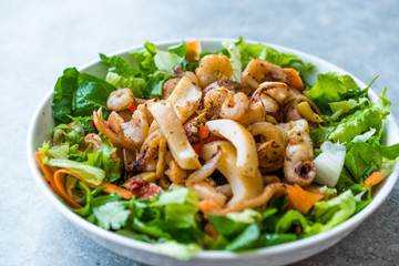Mix of Seafood Salad with Calamari, Shrimp and Octopus.