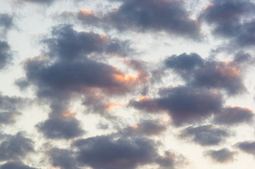 Landscape with dramatic light - beautiful golden sunset with saturated sky and clouds.