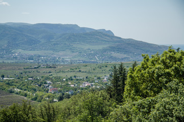 Fototapeta na wymiar Panorama overlooking the Crimean valley, near Bakhchisarai in summer time