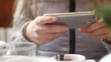 Business woman using a Smart phone Touchscreen CHROMA KEY- Close-up , Fingers make gestures touching typing text and swiping and scrolling the screen of a modern smartphone