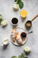 Cup of coffee, freshly baked croissants. Top view. Flat lay. Concept french breakfast.