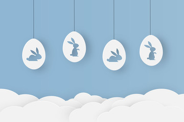 Happy easter paper cut with bunny shaped in eggs that looks cute on blue sky background