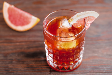 Fright night in the grove cocktail is made from tequila, simple syrup, liqueur and grapefruit juice. The concept of party and Halloween.