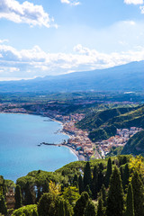 Fototapeta na wymiar Beautiful view to Etna volcano and Mediterranean sea, Taormina, Sicily island, Italy. 