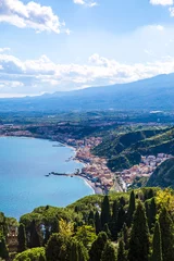 Foto op Canvas Beautiful view to Etna volcano and Mediterranean sea, Taormina, Sicily island, Italy.  © Nataliia