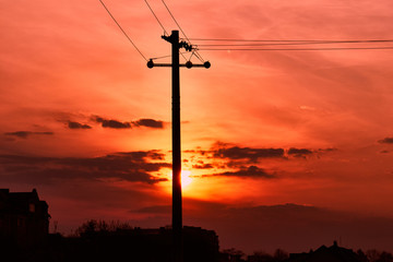 electric post and sunrise landscape , electricity poles with beautiful sunset
